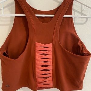 Athleta Conscious Crop sports bra rust coral twist